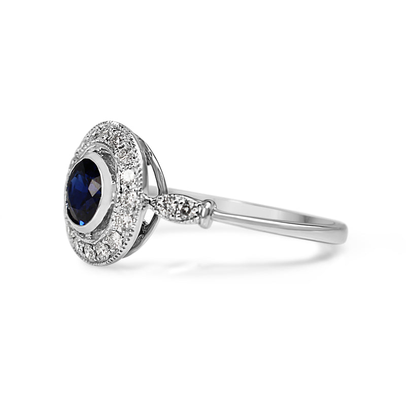 18ct White Gold Sapphire and Diamond Halo Ring