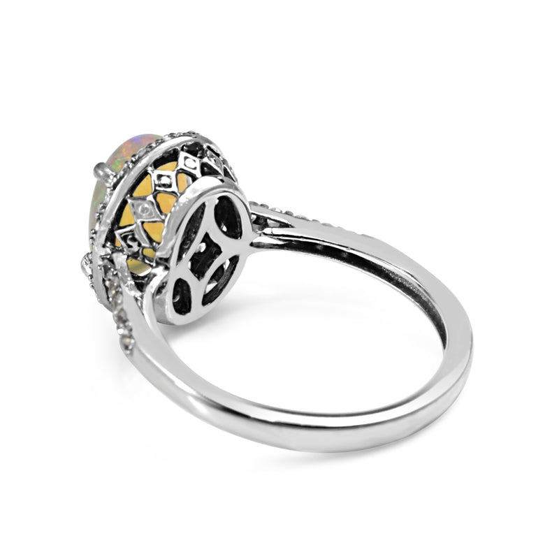 10ct White Gold Opal Diamond Halo Ring