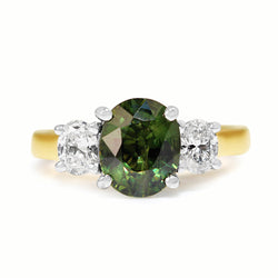 18ct Yellow and White Gold Green Sapphire and Oval Diamond 3 Stone Ring