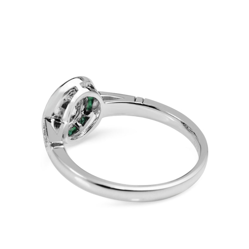 Platinum Art Deco Style Emerald and Diamond Halo Ring