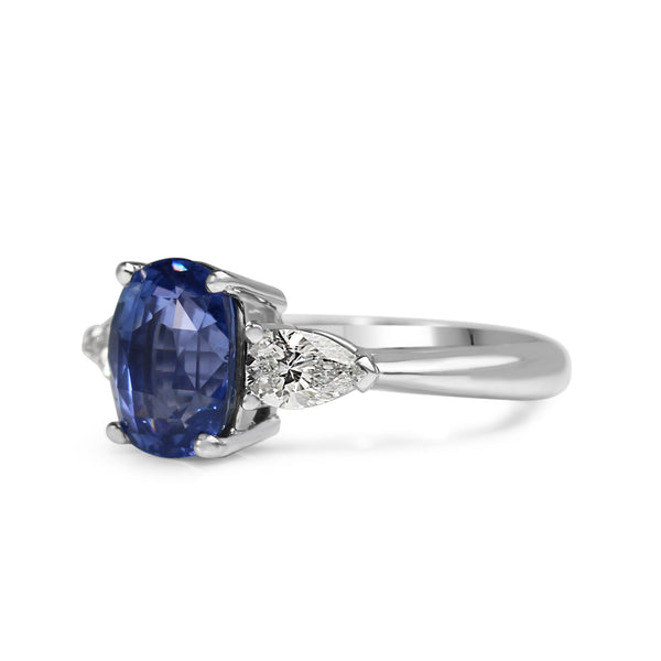 18ct White Gold Cornflower Blue Sapphire and Pear Diamond 3 Stone Ring