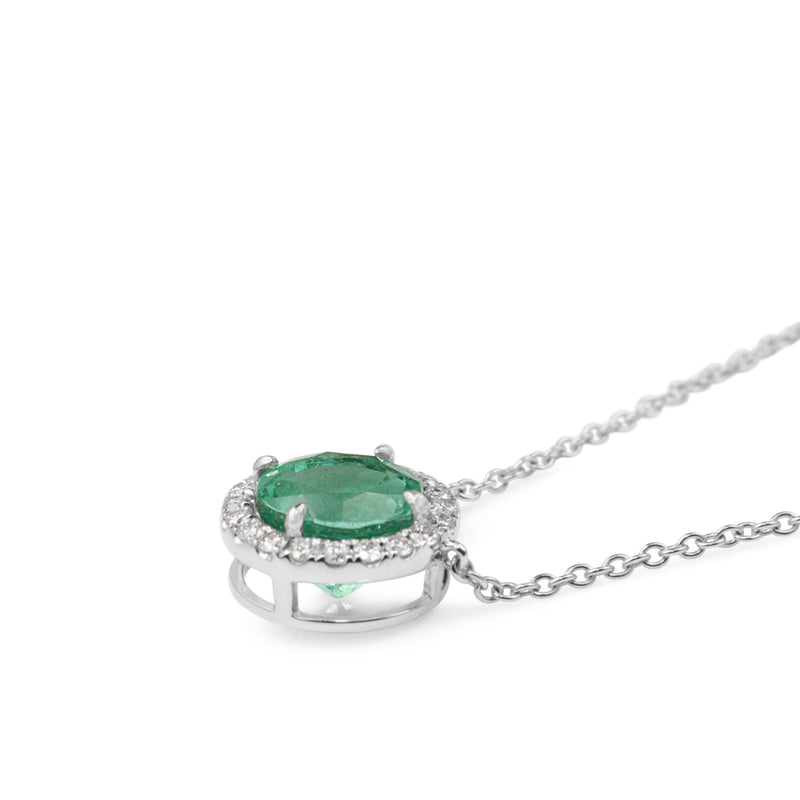 18ct White Gold Emerald and Diamond Halo Necklace