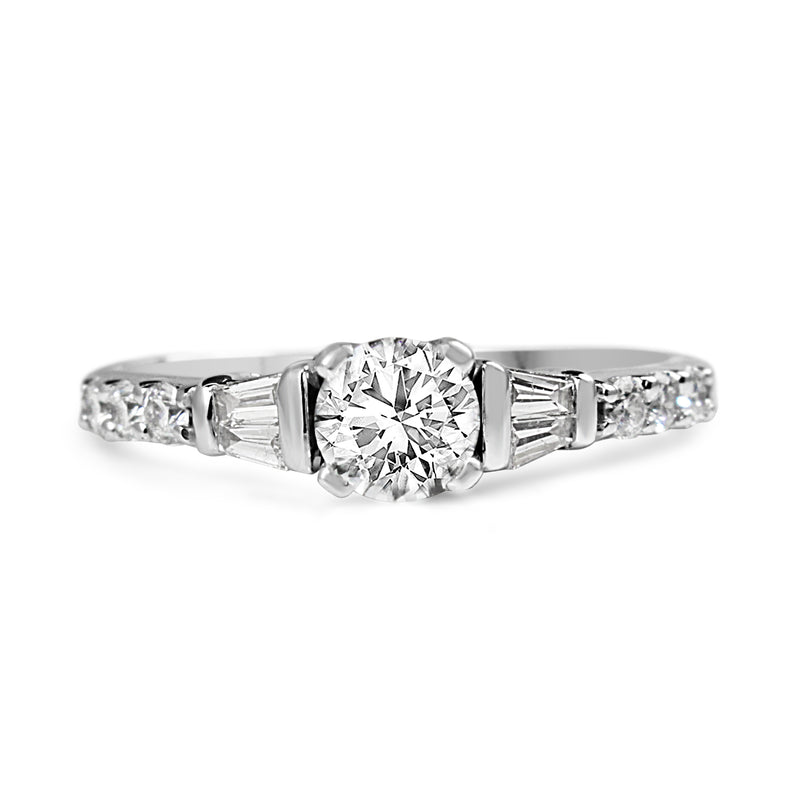 Platinum Diamond Solitaire Ring with Baguette Diamonds