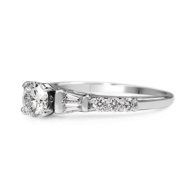 Platinum Diamond Solitaire Ring with Baguette Diamonds