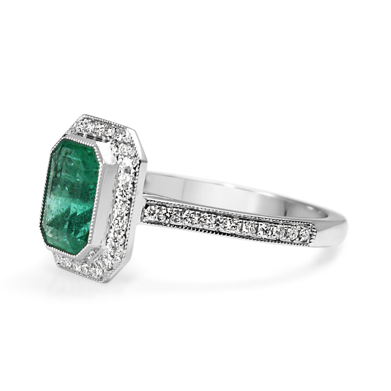 18ct White Gold Emerald and Diamond Halo Ring