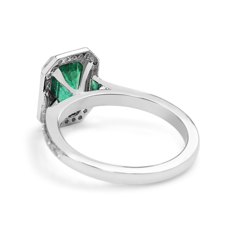 18ct White Gold Emerald and Diamond Halo Ring