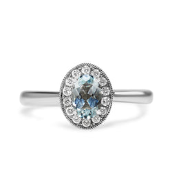 9ct White Gold Oval Aquamarine and Diamond Halo Ring