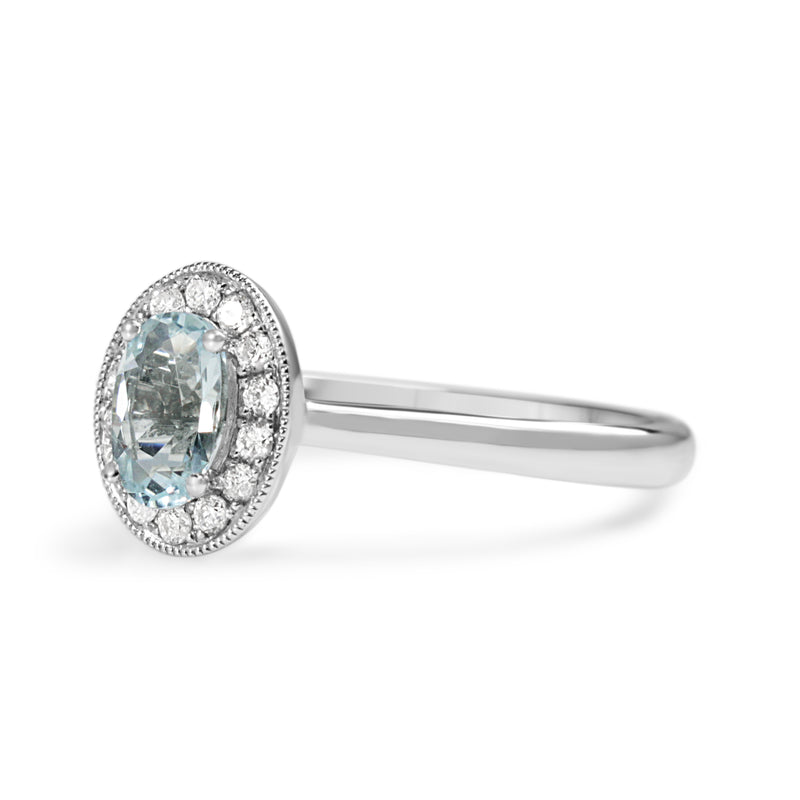 9ct White Gold Oval Aquamarine and Diamond Halo Ring