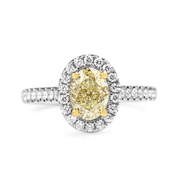 18ct Yellow and White Gold Oval Yellow Diamond Halo Ring