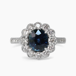 18ct White Gold Sapphire and Diamond Halo Ring