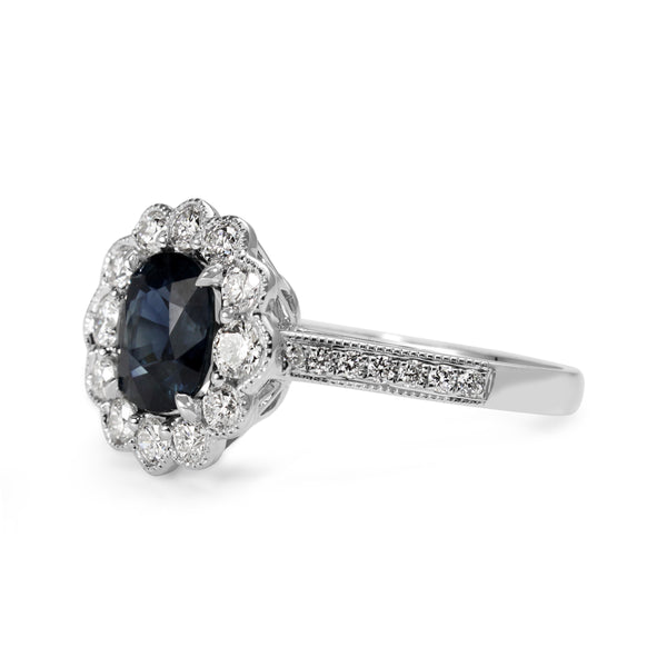 18ct White Gold Sapphire and Diamond Halo Ring