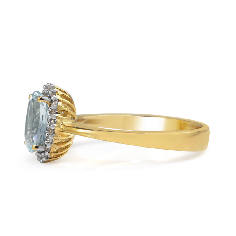 9ct Yellow and White Gold Aquamarine and Diamond Halo Ring