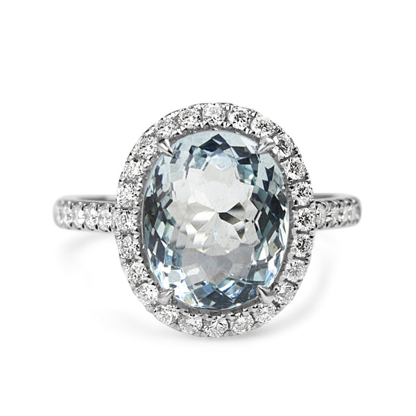 18ct White Gold Oval Aquamarine and Diamond Halo Ring