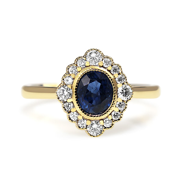 18ct Yellow Gold Sapphire and Diamond Halo Ring