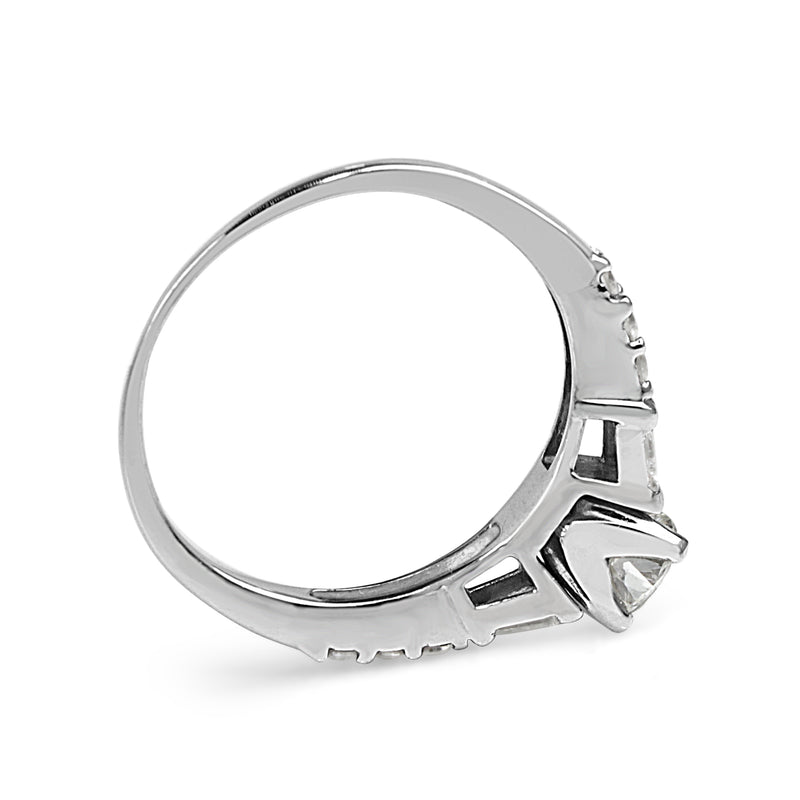 Platinum Diamond Solitaire Ring with Baguette Diamonds
