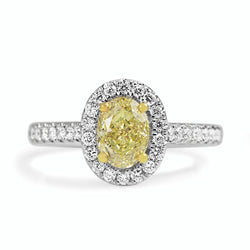 18ct Yellow and White Gold Yellow Oval Diamond Halo Ring