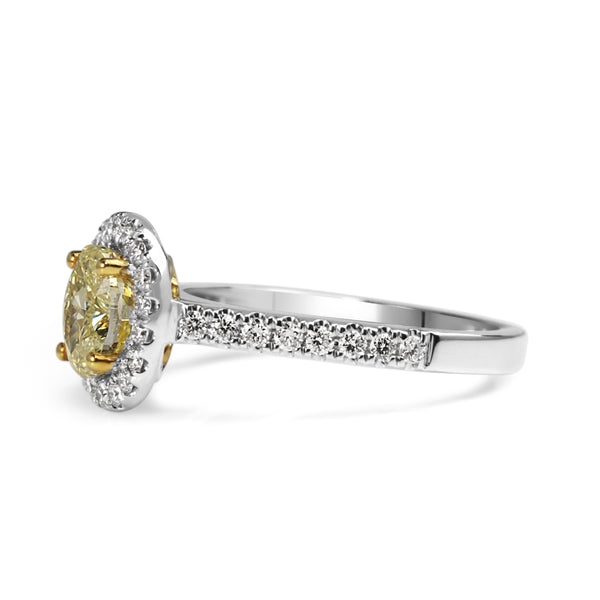 18ct Yellow and White Gold Yellow Oval Diamond Halo Ring