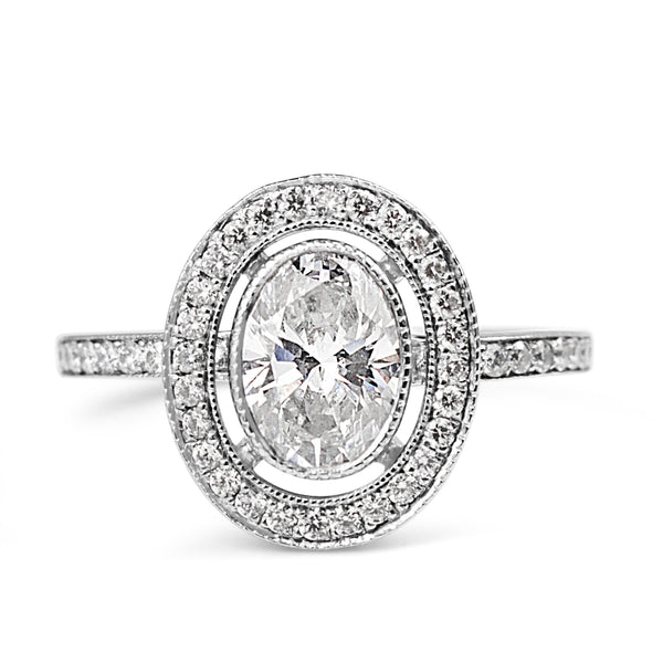 18ct White Gold Oval Diamond Halo Ring