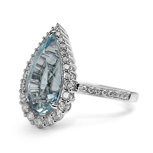 18ct White Gold Pear Aquamarine with Graduated Halo Diamond Ring