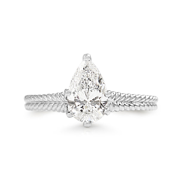 Platinum Pear Diamond Solitaire Ring with Engraved Band