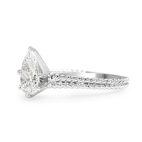 Platinum Pear Diamond Solitaire Ring with Engraved Band