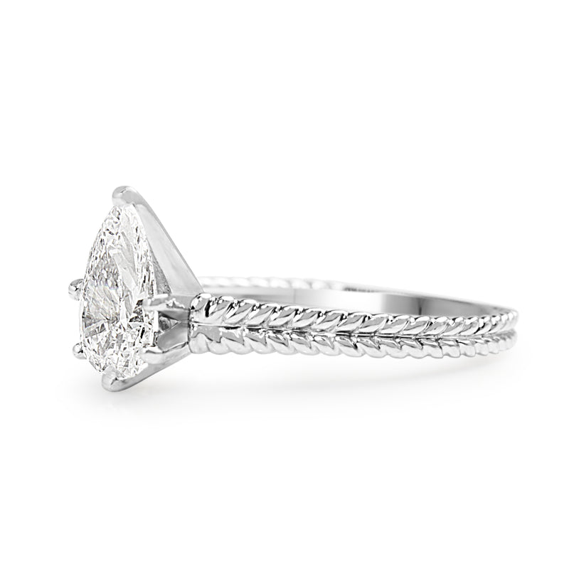 Platinum Pear Diamond Solitaire Ring with Engraved Band